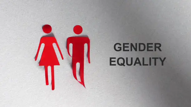 A silhouette in the shape of a red woman and man. The text GENDER EQUALITY.