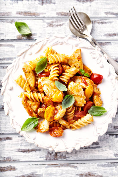 istock Fusilli Pasta with Chicken and Cherry Tomatoes 921559766