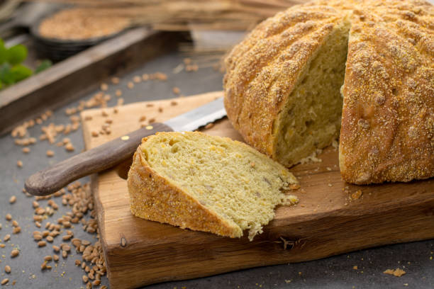 istock Homemade baked round bread with corn and wheat 921560000
