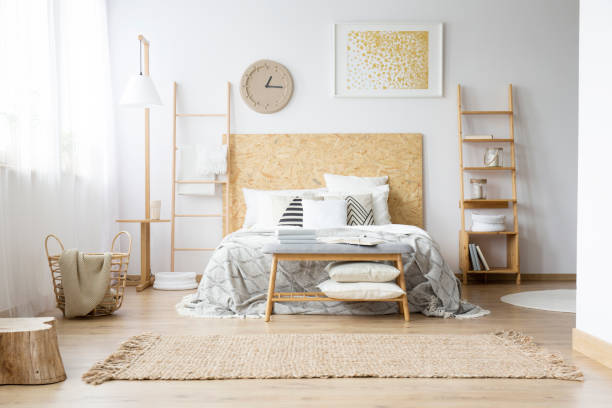 istock Handmade clock in bohemian bedroom 921560514