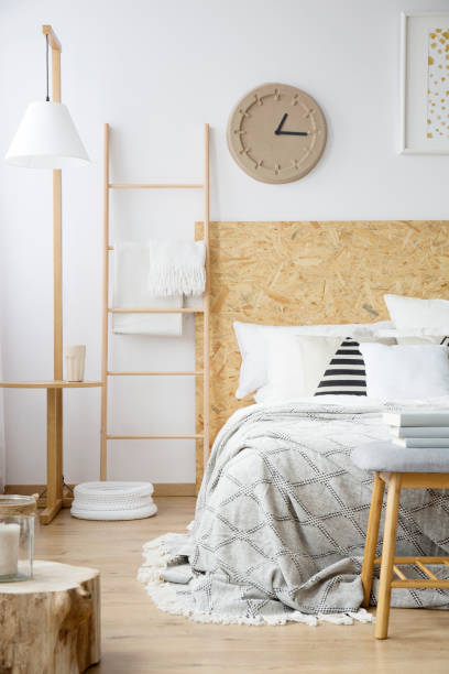 istock Natural bedroom with paper clock 921560520