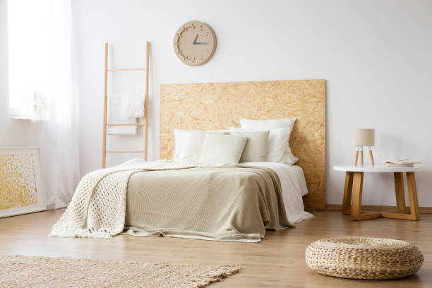 istock Pouf in natural brown bedroom 921560528