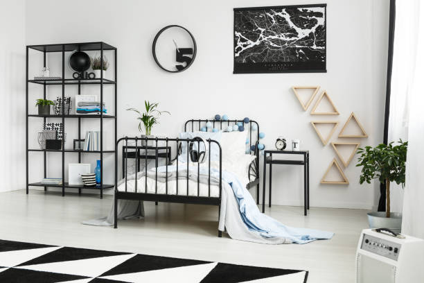 istock Metal bed with headphones 921560550