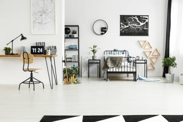 istock Monochromatic bedroom with blue accents 921560566