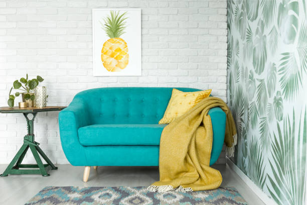 istock Living room with pineapple poster 921560830