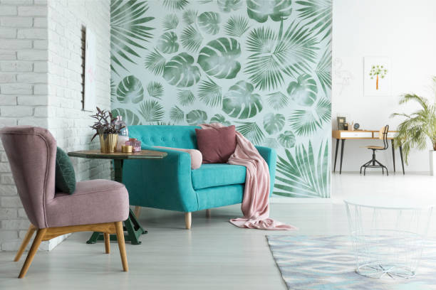 istock Monstera wallpaper in living room 921560836