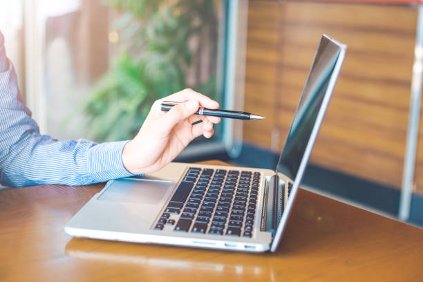 istock Woman hand working on laptop in the office. 921574578