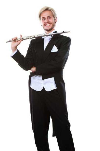 istock Male flutist wearing tailcoat holds flute 921577298