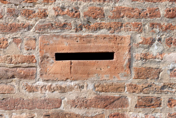 istock Letterbox on a Brick Wall - Ferrara Italy 921578194