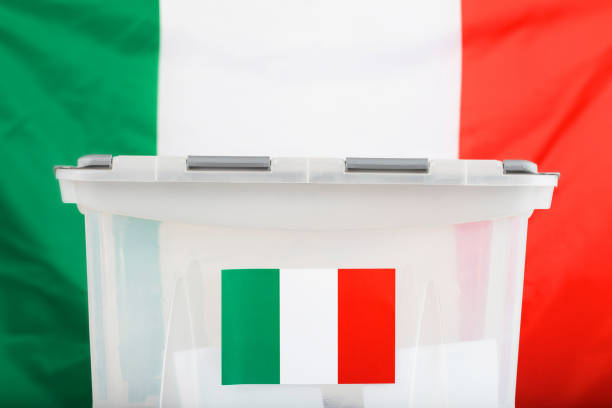 istock Ballot box in front of Italian flag. 921583804