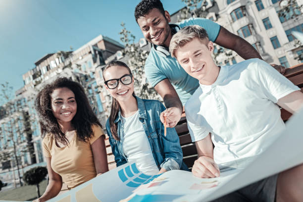 istock Happy smart man pointing at the whatman paper 921584068