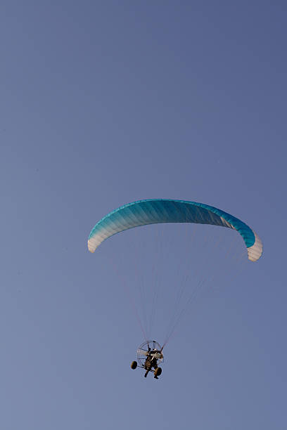 Flying paraglider in the sky 2 stock photo