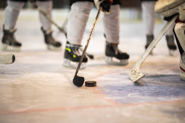 istock Unrecognizable ice hockey players tackling during the game. 921587996