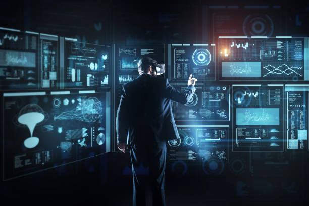 istock Calm man in virtual reality glasses working in his office 921588370