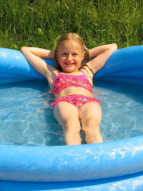 istock Girl in the swimming-pool 92158939