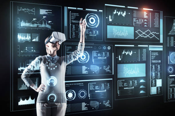 istock Positive person touching the screen while standing in front of it 921591488