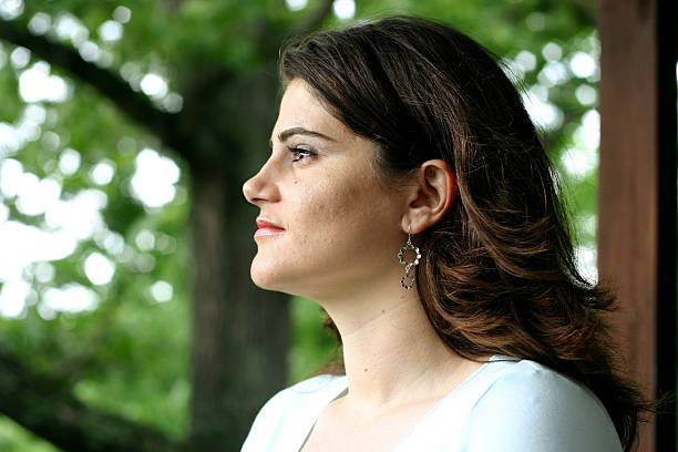 istock Beautiful Brunette Looking Away 92159223
