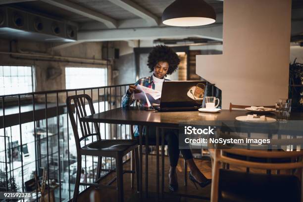 Young Woman Working In Highend Restaurants Stock Photo - Download Image Now - Coffee Shop, Studying, Cafe
