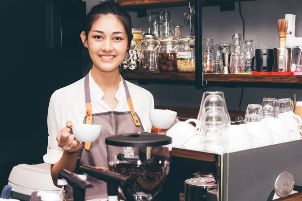 istock Barista holding coffee in coffee shop 921602212