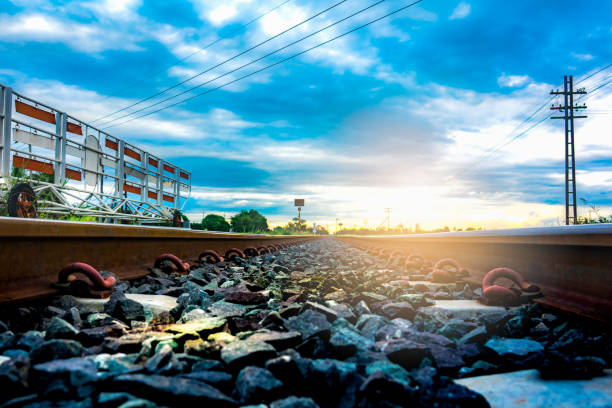 istock Railway of train on traffic light station on blue sky and cloud 921602430