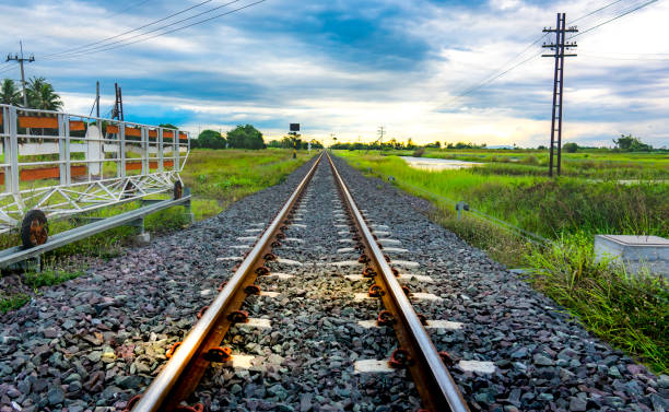 istock Railway of train on traffic light station on blue sky and cloud 921603038