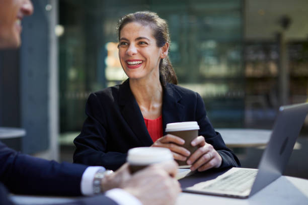 istock Corporate business meeting outdoors on the move. 921609322