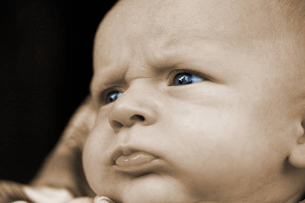 cute baby blue eyed - baby human eye blue toned image стоковые фото и изображения