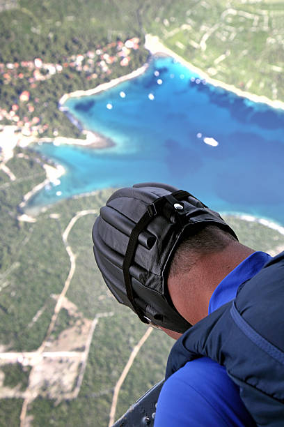 istock Parachuter before jump from the helicopter 92161631