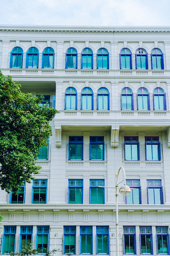 Rounded corner balconies on two apartment buildings