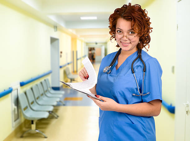 istock doctor with stethoscope in corridor 92161740
