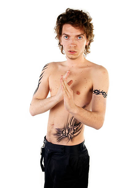 Tattoo Boy  shoulder tribal tattoos for men stock pictures, royalty-free photos & images