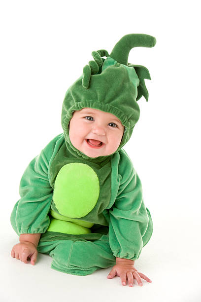 istock Baby wearing peas in pod costume smiling 92163425