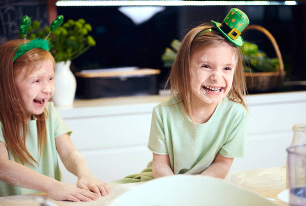 istock Playful kids playing with the flour 921638800