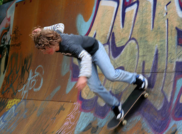 istock Skateboarder teen on graffiti ramp 92163936