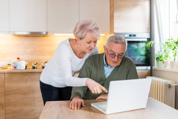 istock Senior Caucasian couple chatting online 921645444