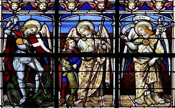 the archangels (stained glass window) - aartsengel stockfoto's en -beelden
