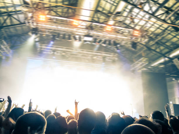 istock Concert crowd in front of a live stage 921653536