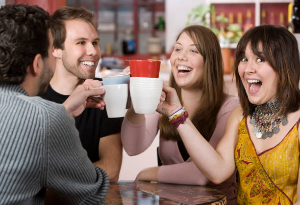 istock Young Friends Toasting with Coffee Cups 92165986