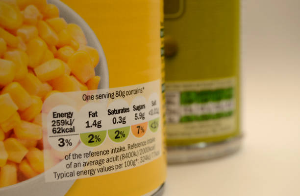 Canned Food Packaging UK Per Serving Nutrition Label Colour coded tinned food nutrional values per serving label labeling photos stock pictures, royalty-free photos & images