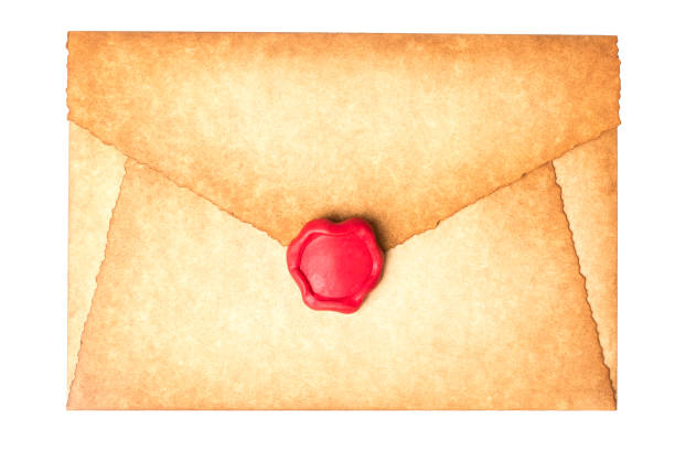 istock Old vintage burned envelope letter with wax seal stamp isolated on a white background 921661092