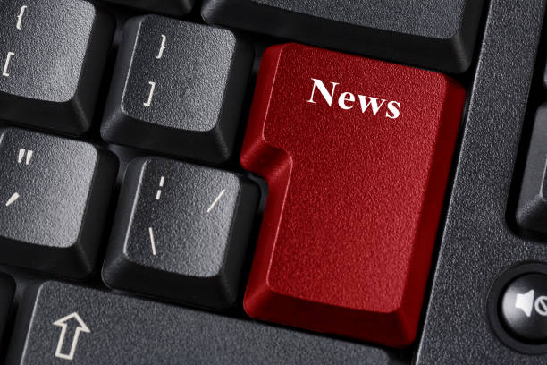 istock Black keyboard with red colored button. News inscription label 921661096