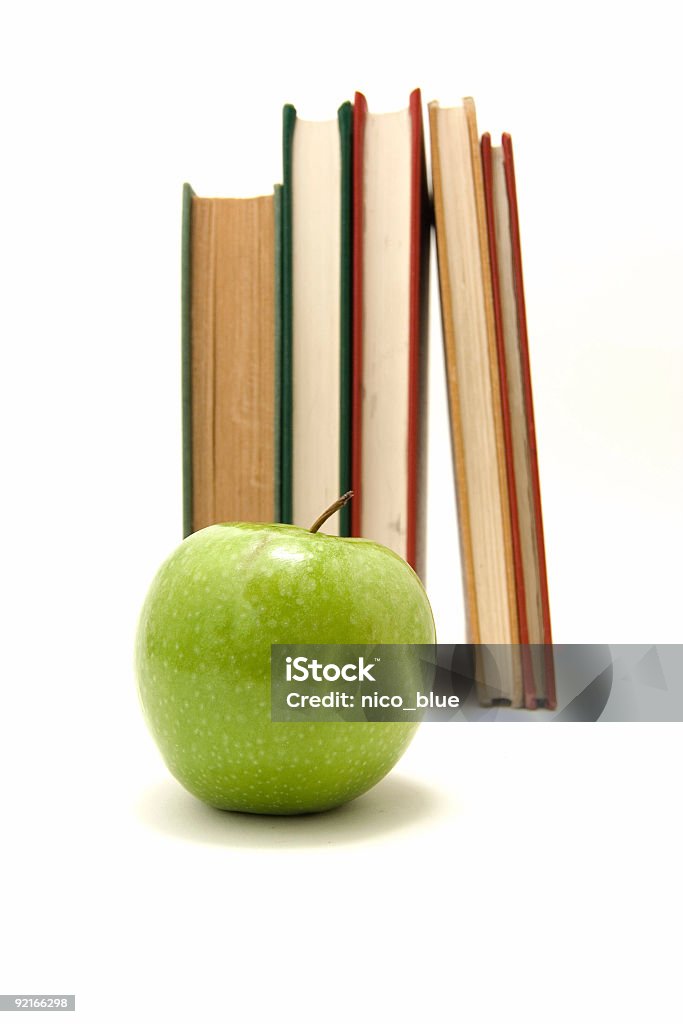 Libros y manzana - Foto de stock de Alimento libre de derechos