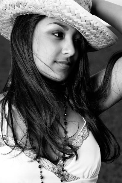 istock Young Ethnic Girl Holding Hat in Black and White. 92166350