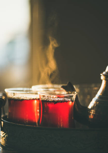 istock Freshly brewed black tea in turkish glasses , close-up 921664408