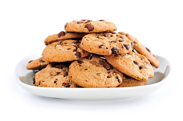 A large plate of chocolate chip cookies stock photo