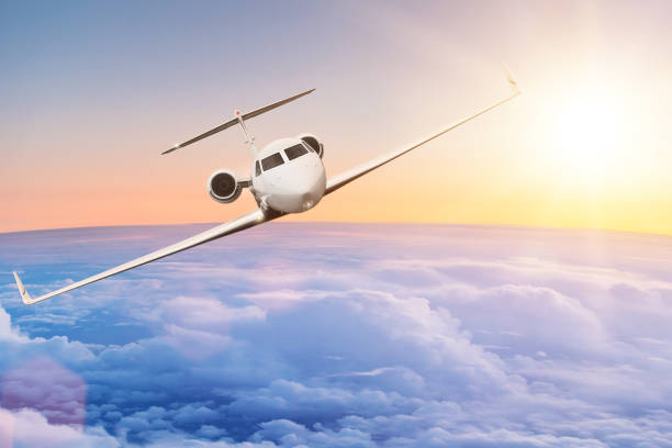 istock Commercial airplane flying above clouds 921677592