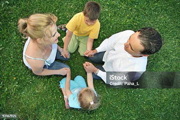 Sitting Family Grass Stock Photo - Download Image Now - Adult, Baby - Human Age, Boys