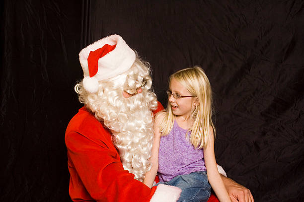 istock santa and young girl 92167947