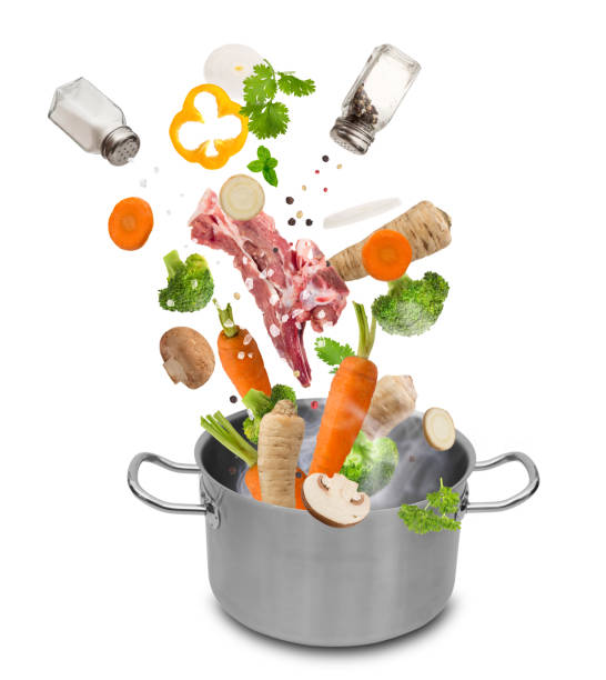 istock Stainless steel pot with flying ingredients 921680586