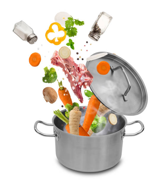 istock Stainless steel pot with flying ingredients 921680622